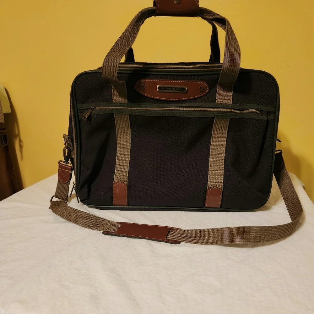 2 piece Vintage American Tourister carry on luggage.